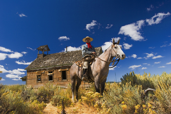 cowboy and barn